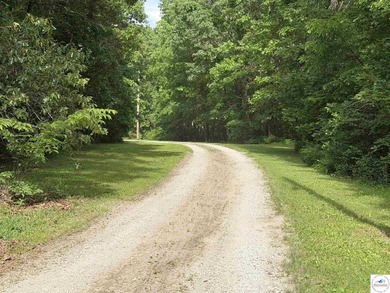 Tucked away at the end of a dead-end road, this beautifully - photo 3