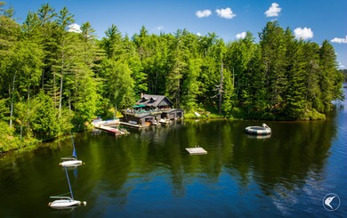 This extraordinary custom-built estate perched along the shores - photo 4