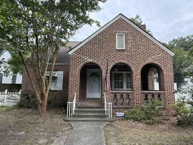 This charming home is full of timeless character and endless - photo 1