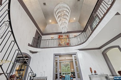 Perched high atop sought-after Tammy Brook Hills, this - photo 3