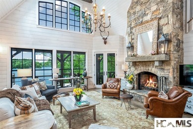On the shores of Lake Glenville, Deer Run Cottage emerges as - photo 7
