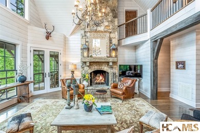 On the shores of Lake Glenville, Deer Run Cottage emerges as - photo 8