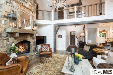 On the shores of Lake Glenville, Deer Run Cottage emerges as - photo 9