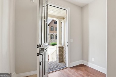 Welcome to this beautifully designed luxury townhome located in - photo 3