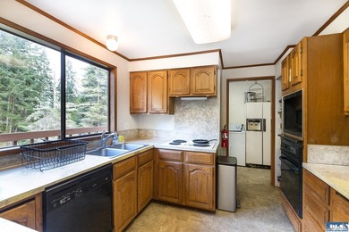 Nestled on 5 private acres in Sequim, this stunning 3 - photo 16