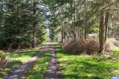 Nestled on 5 private acres in Sequim, this stunning 3 - photo 25