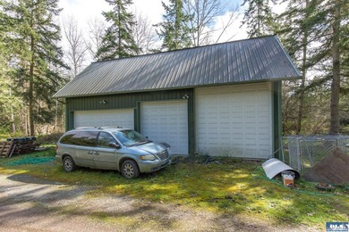 Nestled on 5 private acres in Sequim, this stunning 3 - photo 27