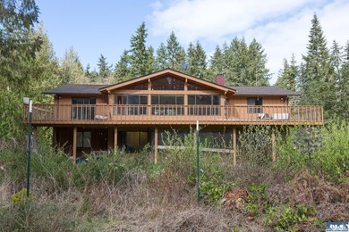 Nestled on 5 private acres in Sequim, this stunning 3 - photo 31
