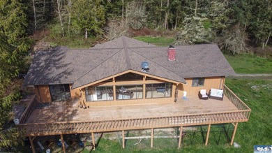 Nestled on 5 private acres in Sequim, this stunning 3 - photo 37