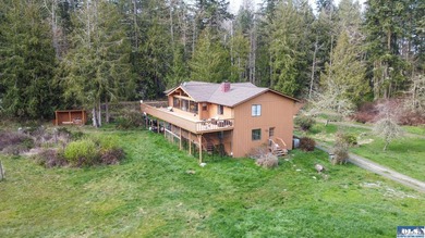 Nestled on 5 private acres in Sequim, this stunning 3 - photo 39