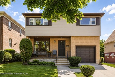 Custom two family detached home located in the exclusive - photo 1