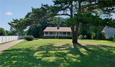 Experience lake living at its finest in this charming 4-bedroom - photo 2