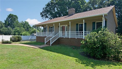 Experience lake living at its finest in this charming 4-bedroom - photo 3