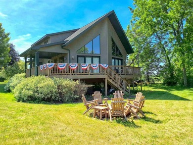 Nestled along a stunning golf course with beautiful views of the - photo 1