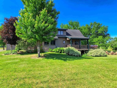 Nestled along a stunning golf course with beautiful views of the - photo 3