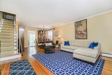 Welcome to this spacious semi-detached home located in one of - photo 3