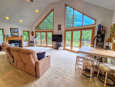 Nestled along a stunning golf course with beautiful views of the - photo 9