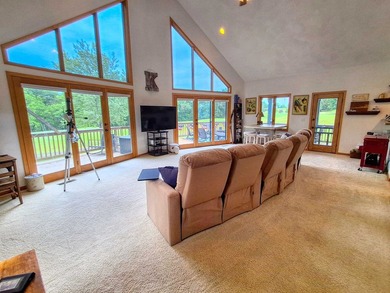 Nestled along a stunning golf course with beautiful views of the - photo 10