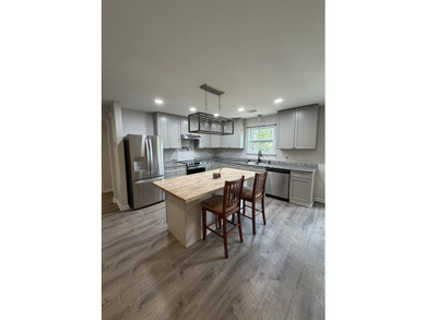 Welcome to 130 Emmons Lane, a beautifully maintained, newer - photo 1