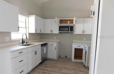 3 bedroom, 2 bath home with split bedroom plan, rear screened - photo 4