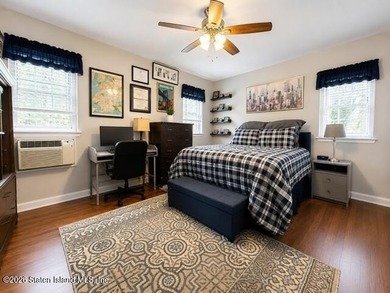 Updated 1-bedroom, 1-bath home featuring a modern kitchen, wood - photo 9
