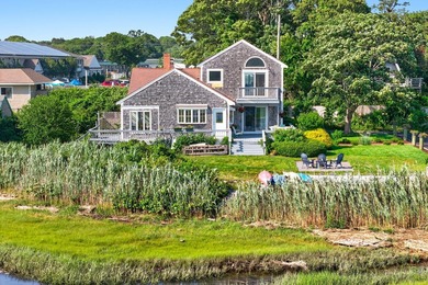 21 Ken's Way Some homes sit beside the water. This one lives in - photo 4