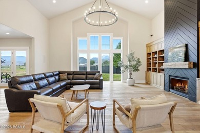 Set on a fully landscaped acre with open views of Mount - photo 3