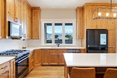 Set on a fully landscaped acre with open views of Mount - photo 7