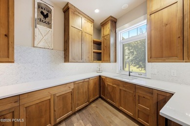 Set on a fully landscaped acre with open views of Mount - photo 9