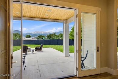Set on a fully landscaped acre with open views of Mount - photo 10