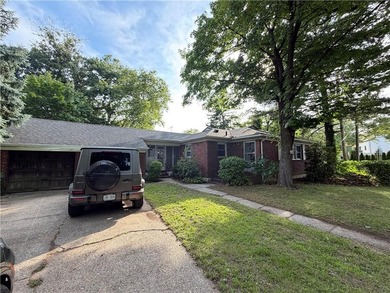 Outstanding opportunity to own a spacious brick ranch on an - photo 1
