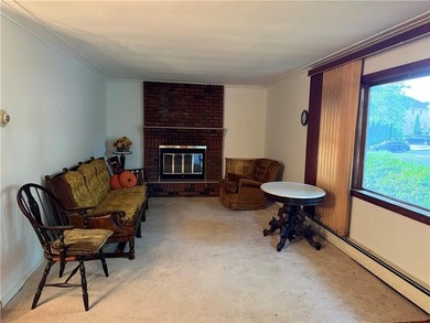 Outstanding opportunity to own a spacious brick ranch on an - photo 2