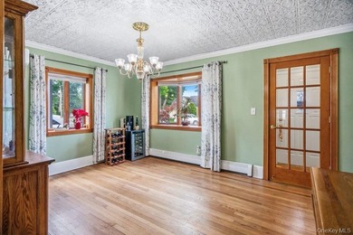 Set on a level, fully fenced property in East Islip, this 3 - photo 8
