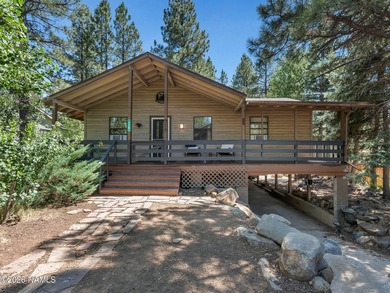 Welcome to your dream getaway nestled among the towering - photo 1