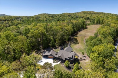 Discover refined mountain living in the heart of Chinquapin, a - photo 7