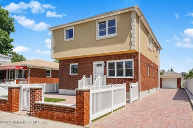 Extensively upgraded two-family detached house in the heart of - photo 2