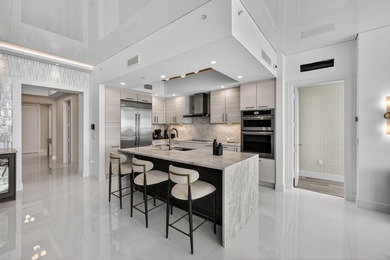 Commanding the 20th floor of the iconic Water Club Condominium - photo 9