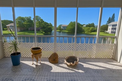 Lake Condo For Sale in Coral Springs, Florida