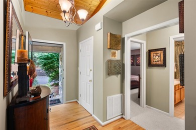 Set among the peaceful woods of Lake Toxaway Estates, this - photo 4