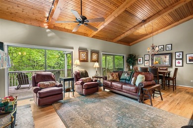 Set among the peaceful woods of Lake Toxaway Estates, this - photo 5