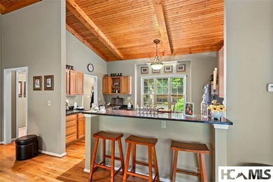 Set among the peaceful woods of Lake Toxaway Estates, this - photo 8