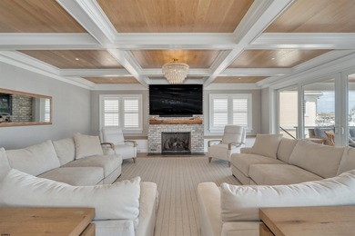 Welcome to 55 Walnut Road, a stunning bayfront masterpiece. This