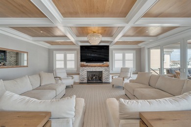 Welcome to 55 Walnut Road, a stunning bayfront masterpiece. This