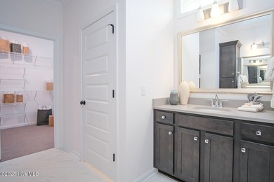 This two-story, brick front Jensen plan features three bedrooms - photo 14