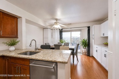 Welcome to this spacious and well-maintained two-bedroom condo - photo 9