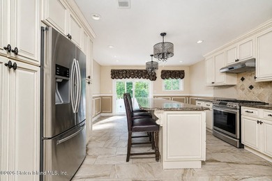 Welcome to this gorgeous semi-attached home in the heart of - photo 7