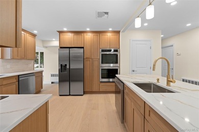 Welcome to 31 Cail Drive, a beautifully renovated ranch that - photo 4