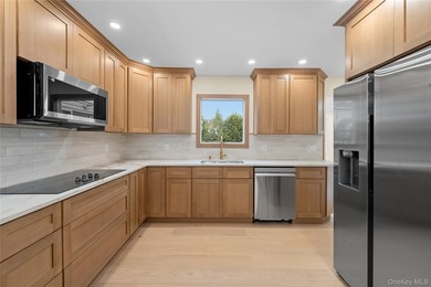 Welcome to 31 Cail Drive, a beautifully renovated ranch that - photo 6
