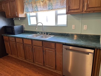 Beautiful Beach/Lake- Large 3-bedroom, 2-bath home situated on a - photo 9