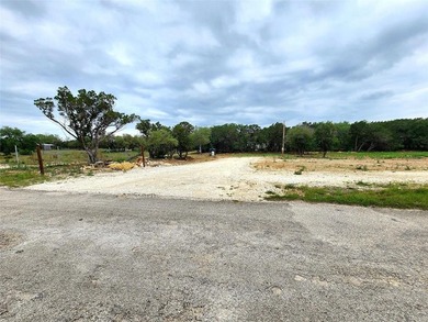 Unrestricted 1.24-acre corner lot in Lakehills offering a great - photo 1